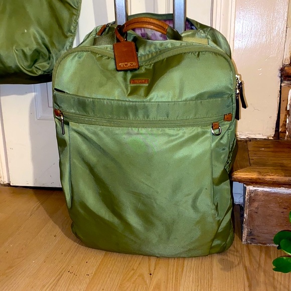 Tumi Bags Tumi Green Rolling Suitcase Poshmark